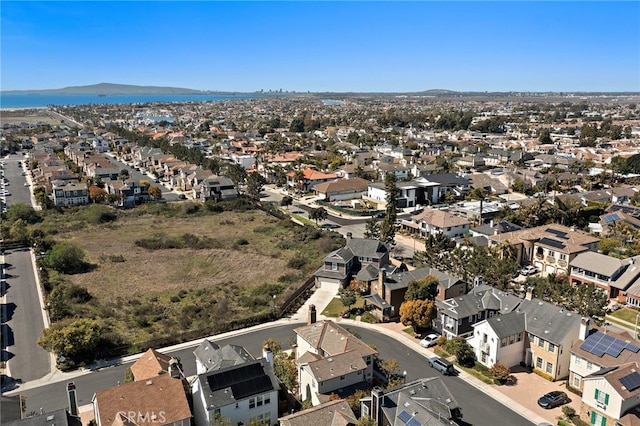 bird's eye view featuring a mountain view and a residential view