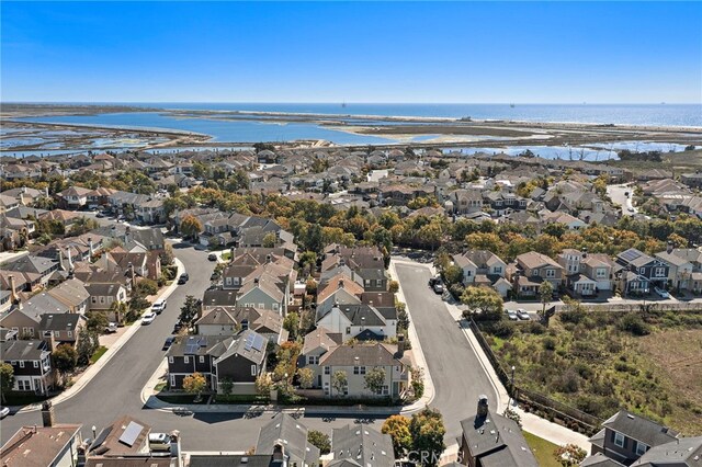 aerial view with a residential view and a water view