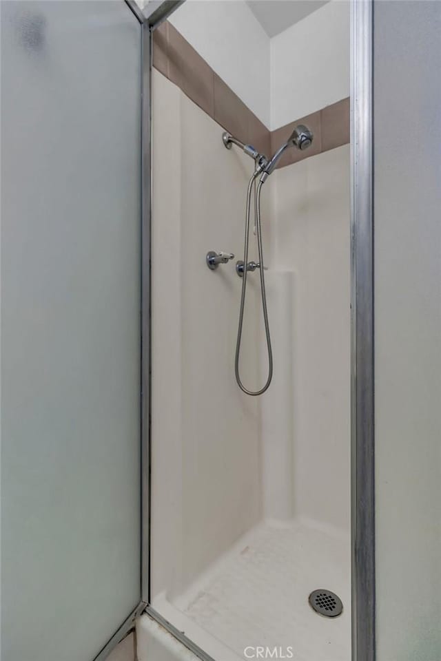 bathroom with a stall shower