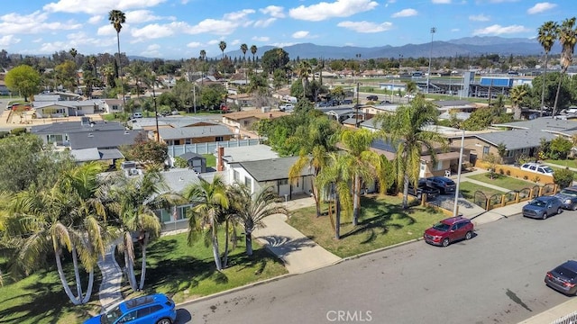 birds eye view of property featuring a residential view and a mountain view