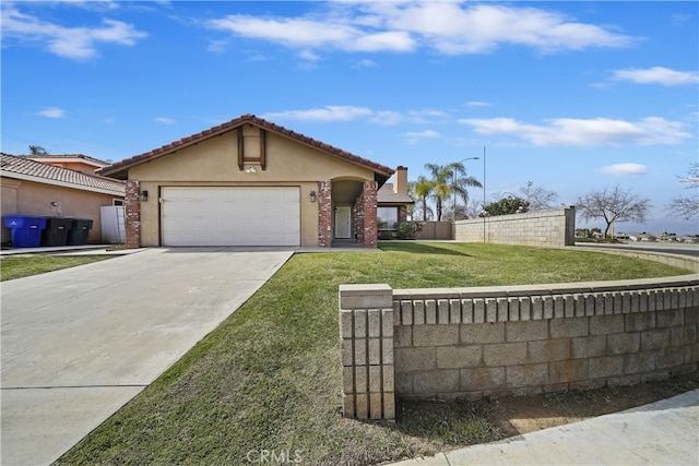 view of front of home with a garage, fence, driveway, stucco siding, and a front yard