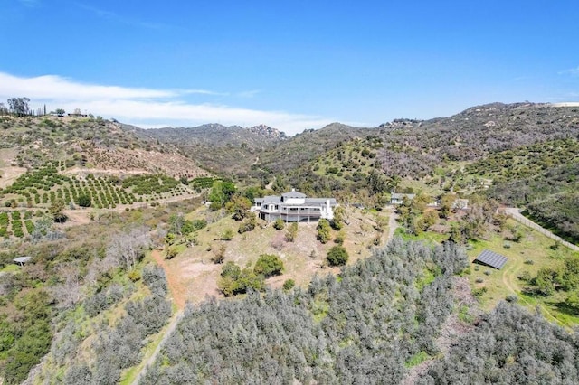 birds eye view of property with a rural view and a mountain view