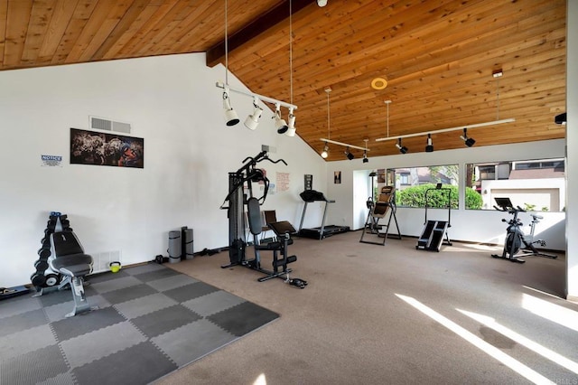 exercise room with wood ceiling, high vaulted ceiling, visible vents, and track lighting