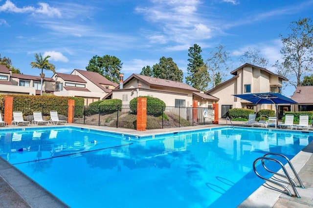 pool featuring fence