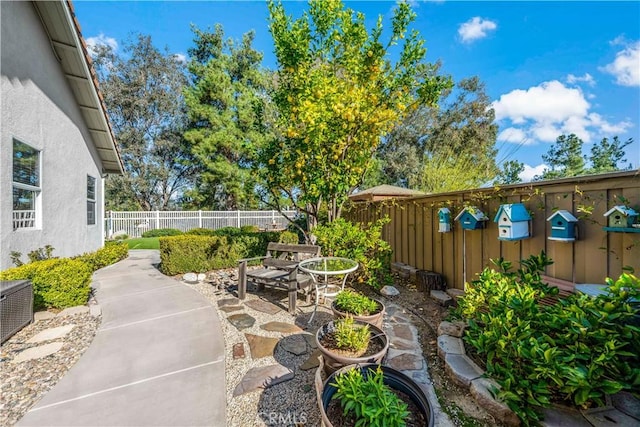 view of patio / terrace featuring fence