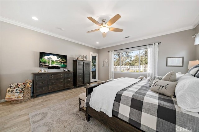 bedroom with crown molding, recessed lighting, visible vents, ceiling fan, and light wood-type flooring