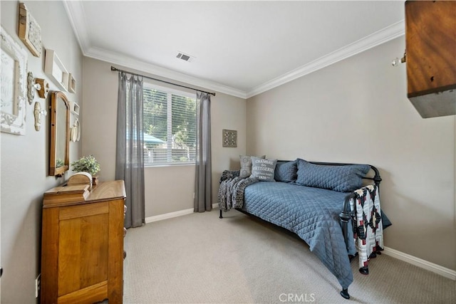 bedroom with ornamental molding, light colored carpet, visible vents, and baseboards