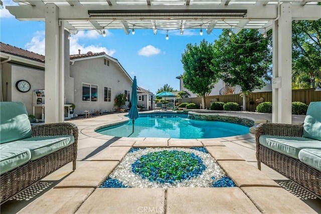 view of swimming pool with a fenced in pool, a fenced backyard, a patio, and a pergola