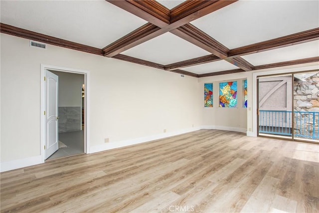 unfurnished room with visible vents, wood finished floors, coffered ceiling, beamed ceiling, and baseboards