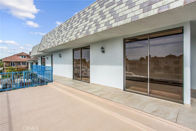 view of patio / terrace featuring a balcony