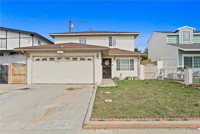 traditional-style home with stucco siding, concrete driveway, a gate, fence, and a garage