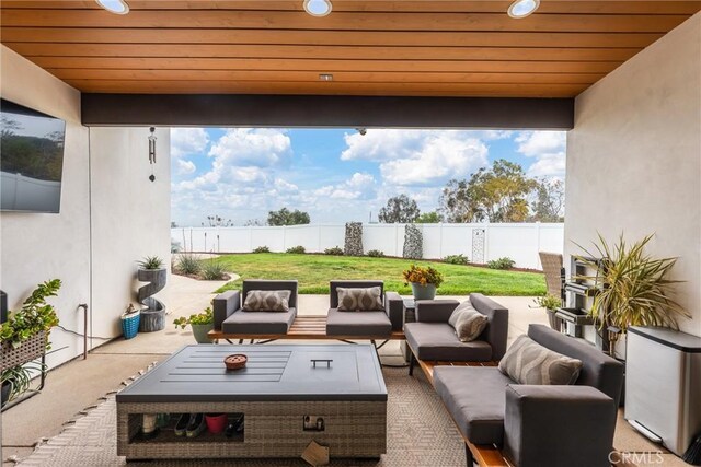 view of patio / terrace with an outdoor hangout area and a fenced backyard