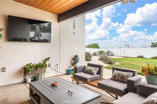 view of patio / terrace featuring a fenced backyard and an outdoor living space