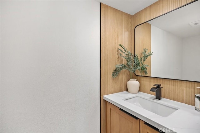 bathroom featuring visible vents and vanity