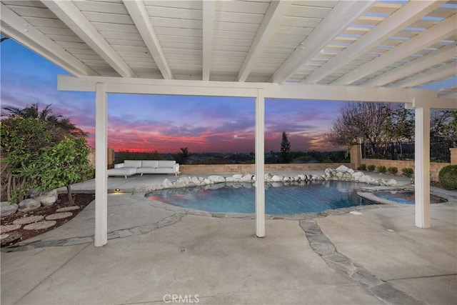 pool featuring a patio area