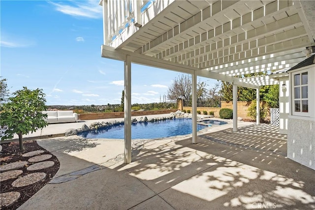 pool with a patio area, a fenced backyard, and a pergola