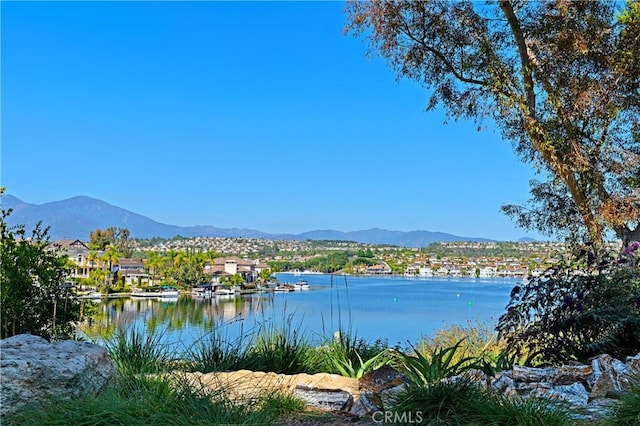 property view of water featuring a mountain view