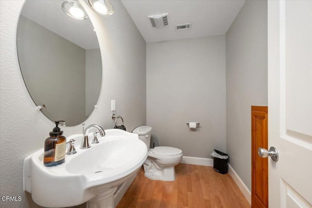 2438 Captains Walk, Bradley, CA 93426 - bathroom with wood finished floors and toilet