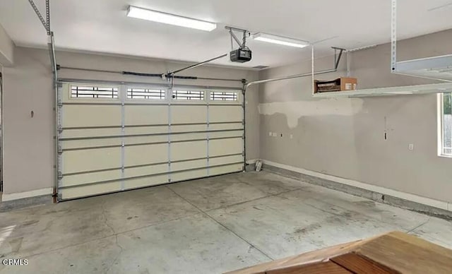 2438 Captains Walk, Bradley, CA 93426 - garage with a garage door opener and baseboards
