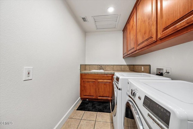 2438 Captains Walk, Bradley, CA 93426 - washroom with cabinet space, independent washer and dryer, light tile patterned floors, and recessed lighting