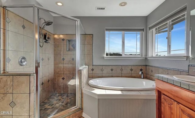 2438 Captains Walk, Bradley, CA 93426 - full bath with a bath, vanity, a stall shower, and recessed lighting