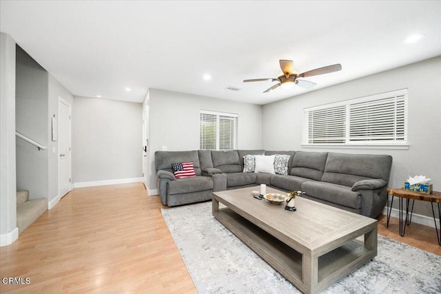 2438 Captains Walk, Bradley, CA 93426 - living room featuring stairway, light wood-style flooring, recessed lighting, and a ceiling fan
