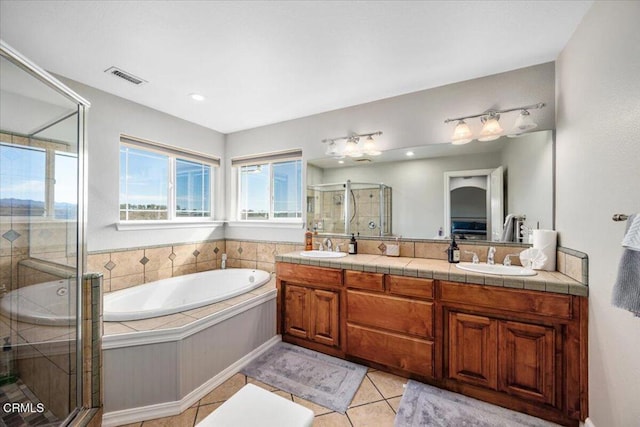 2438 Captains Walk, Bradley, CA 93426 - bathroom with a garden tub, double vanity, a stall shower, and tile patterned floors