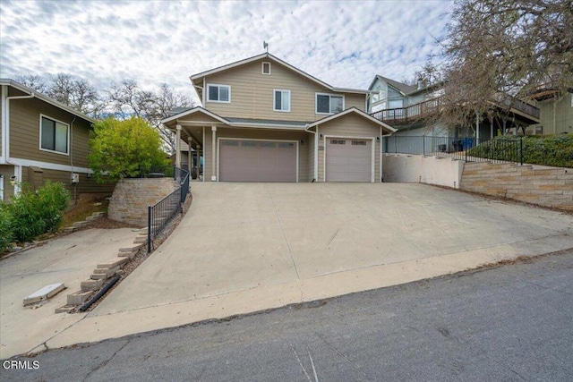 2438 Captains Walk, Bradley, CA 93426 - view of front facade featuring concrete driveway and an attached garage
