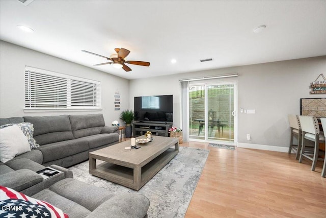 2438 Captains Walk, Bradley, CA 93426 - living room with a ceiling fan, light wood-style floors, and recessed lighting