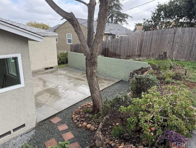 view of patio / terrace with fence