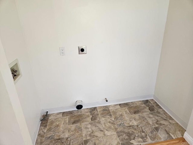 laundry area featuring baseboards, hookup for an electric dryer, washer hookup, and stone finish floor