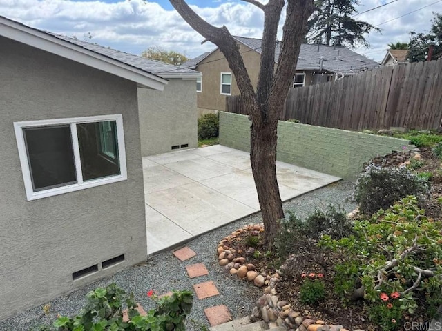 view of patio / terrace with fence