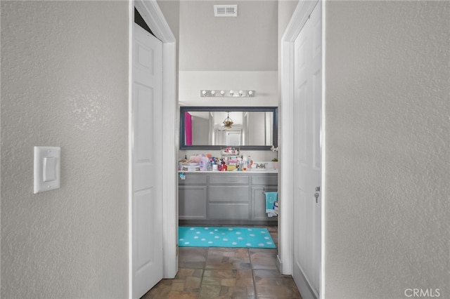 36857 42nd St E, Palmdale, CA 93552 - hallway with visible vents and a textured wall