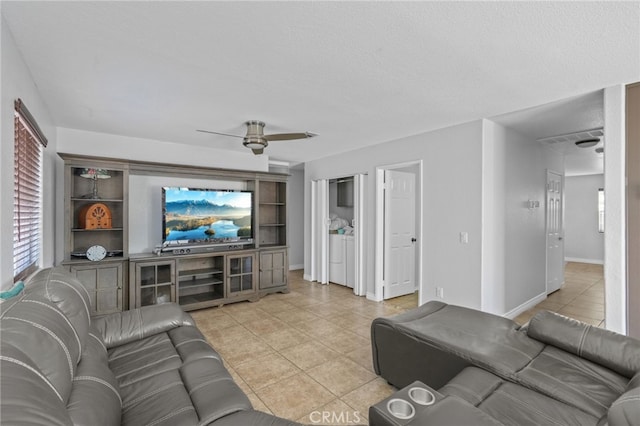 36857 42nd St E, Palmdale, CA 93552 - living area with ceiling fan, a textured ceiling, baseboards, and light tile patterned floors