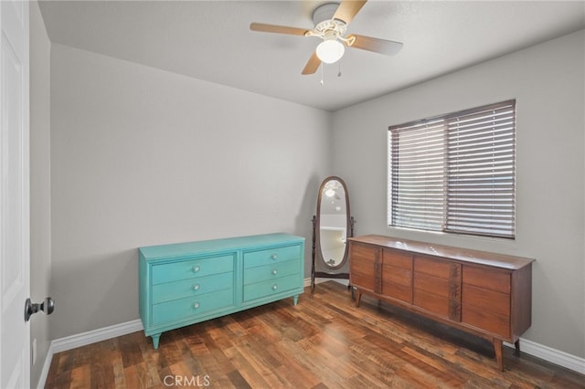 36857 42nd St E, Palmdale, CA 93552 - miscellaneous room with dark wood-style floors, a ceiling fan, and baseboards