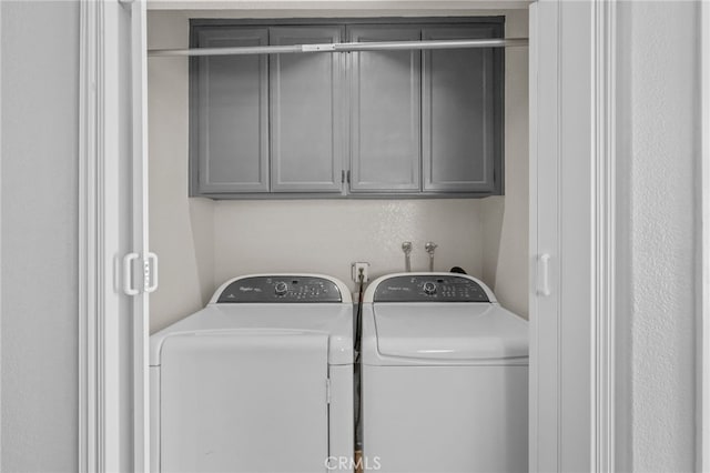 36857 42nd St E, Palmdale, CA 93552 - laundry room with washing machine and dryer and cabinet space