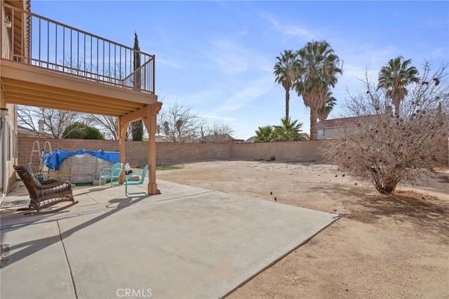 36857 42nd St E, Palmdale, CA 93552 - view of patio with a fenced backyard