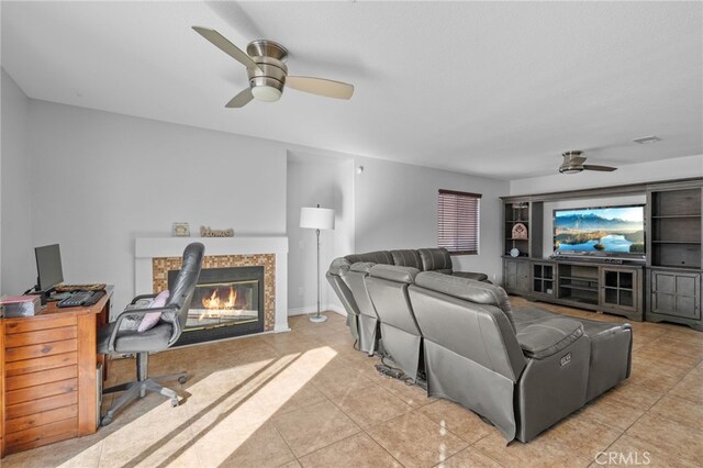 36857 42nd St E, Palmdale, CA 93552 - home theater room with a ceiling fan and light tile patterned flooring