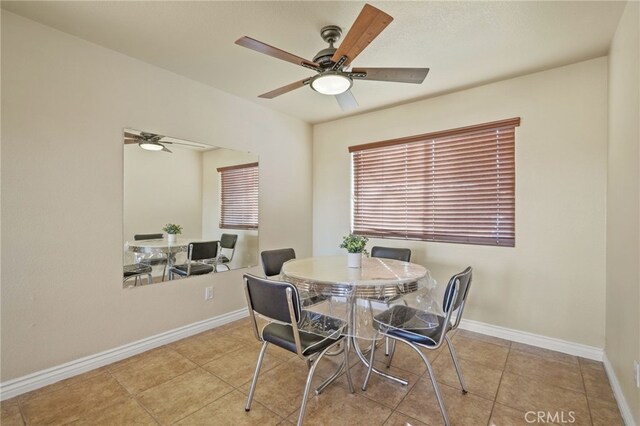 36857 42nd St E, Palmdale, CA 93552 - tiled dining space with ceiling fan and baseboards