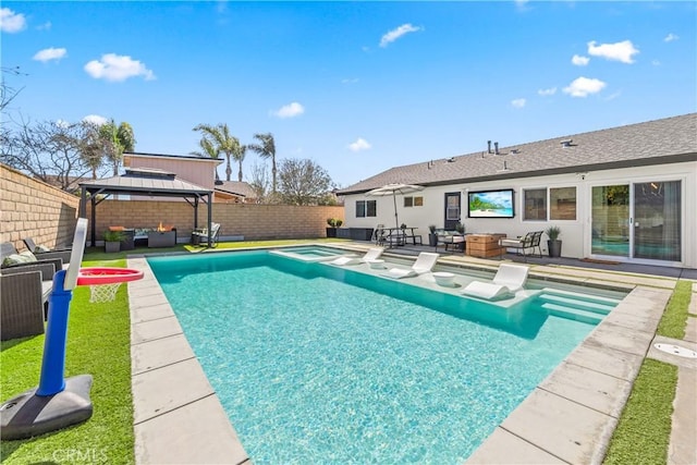 view of pool featuring a fenced in pool, a fenced backyard, a gazebo, and an outdoor hangout area