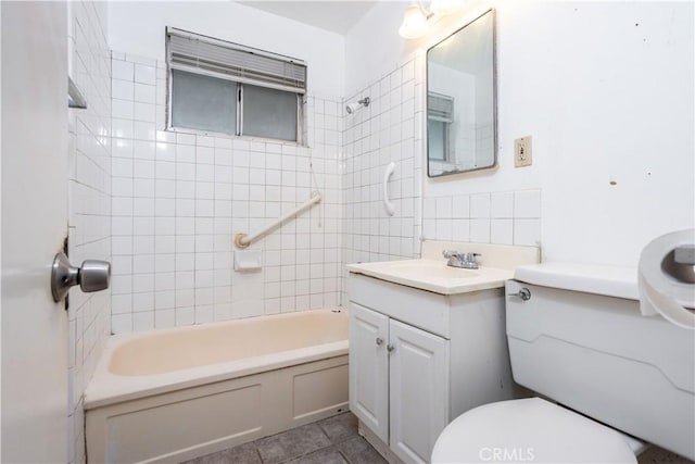 bathroom featuring toilet, tile patterned floors, vanity, tub / shower combination, and decorative backsplash