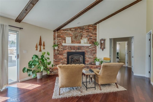 living room featuring dark wood-style flooring, baseboards, a fireplace, and beam ceiling