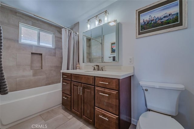 bathroom featuring vanity, shower / tub combo, tile patterned flooring, and toilet