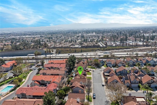 aerial view featuring a residential view and a mountain view