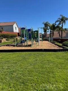 communal playground with a yard