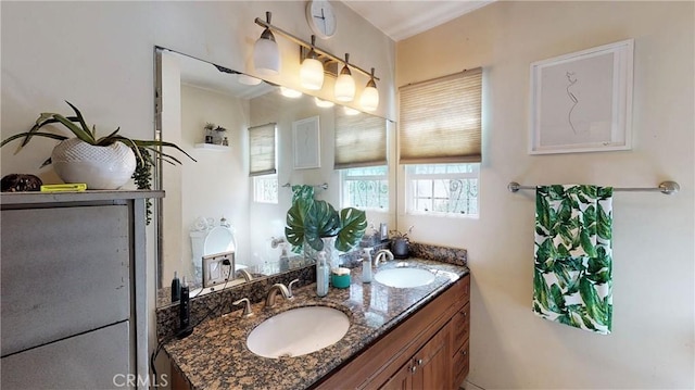 bathroom with double vanity and a sink