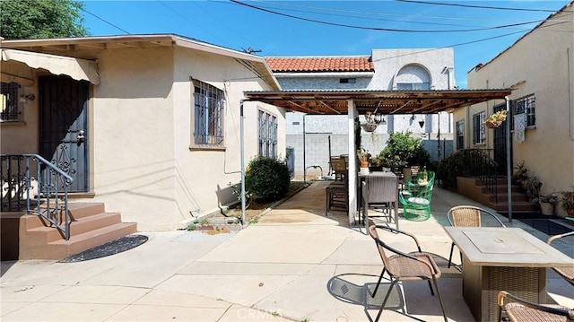 view of patio with outdoor dining space