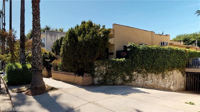 exterior space featuring stucco siding