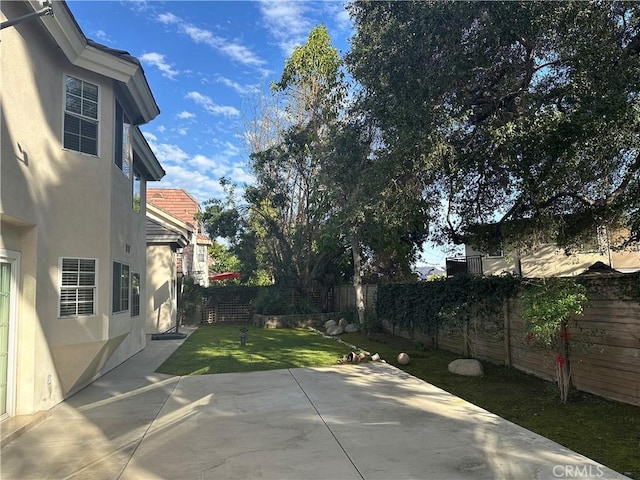 view of patio featuring a fenced backyard