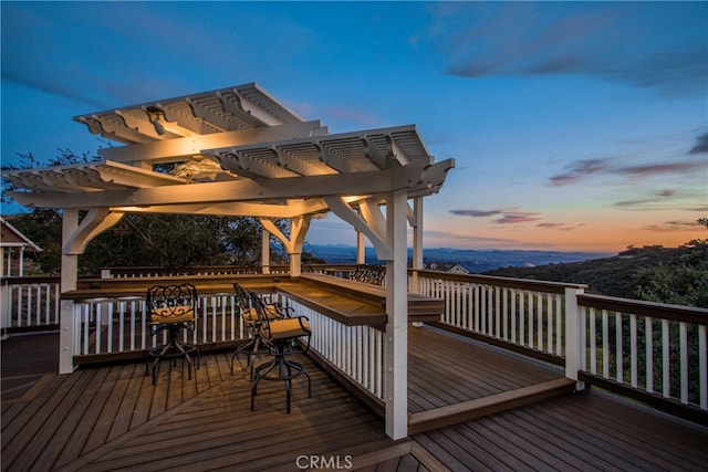 deck featuring a pergola